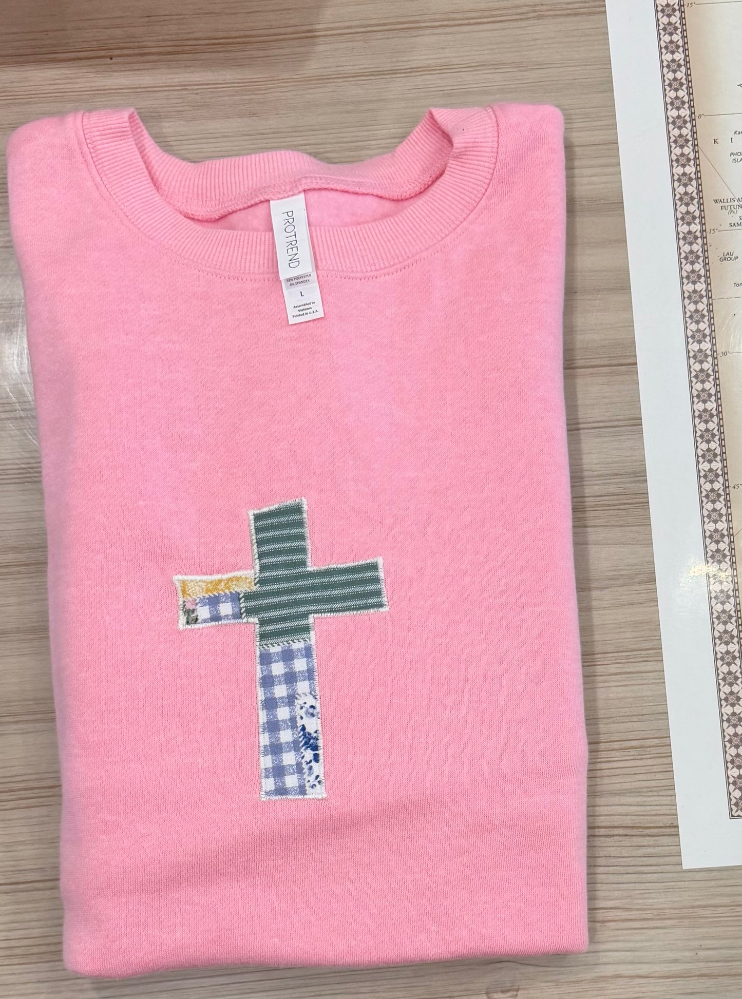 Large pink cross sweatshirt