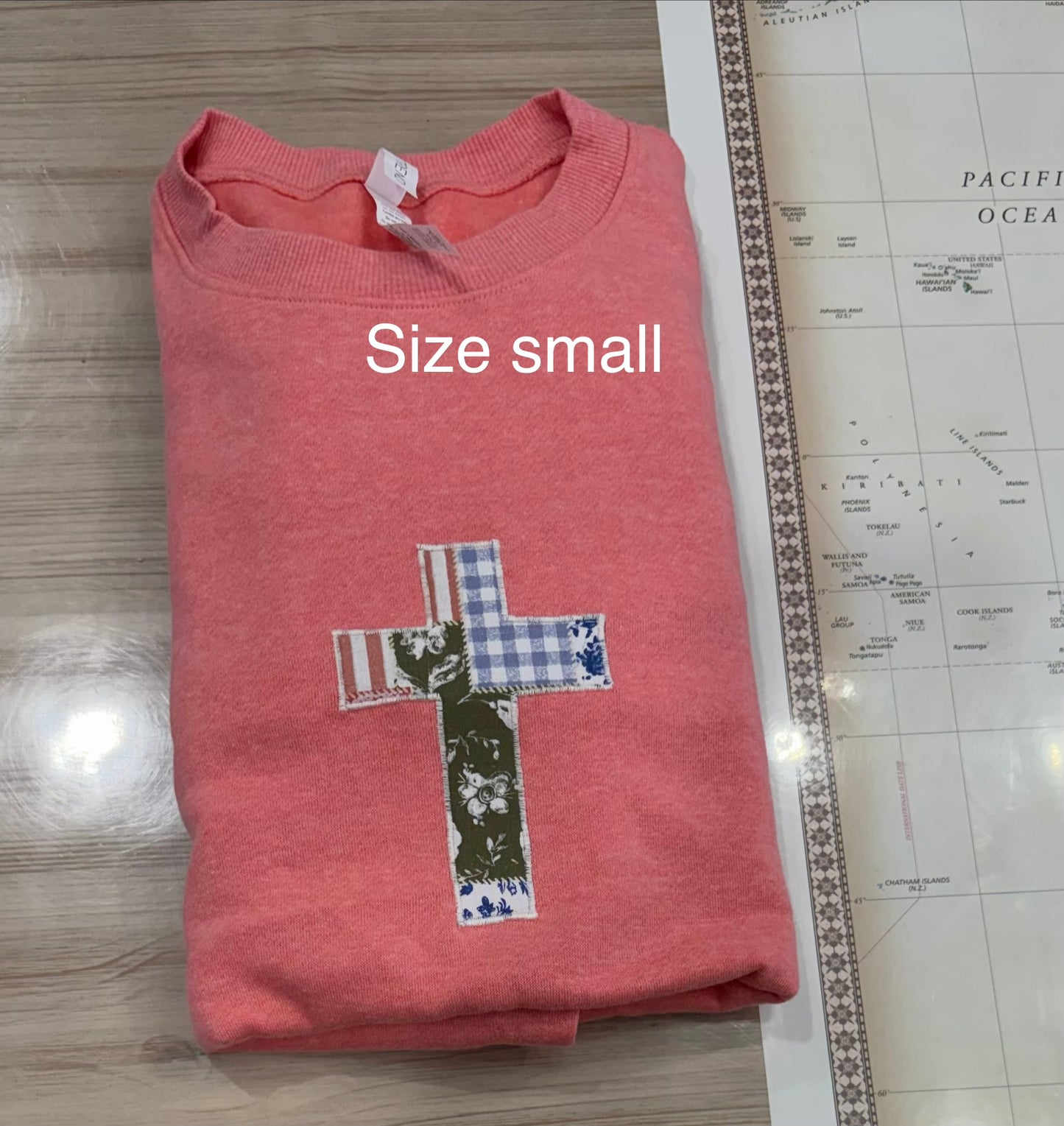 Small coral cross sweatshirt