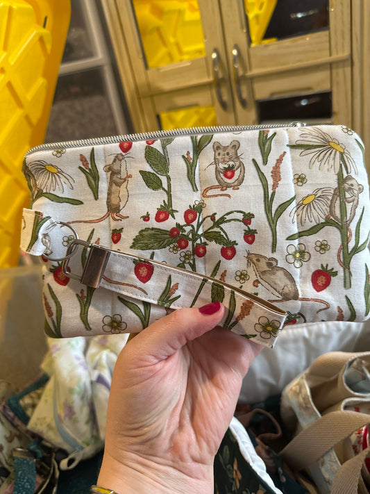 Phone wallet with wristlet